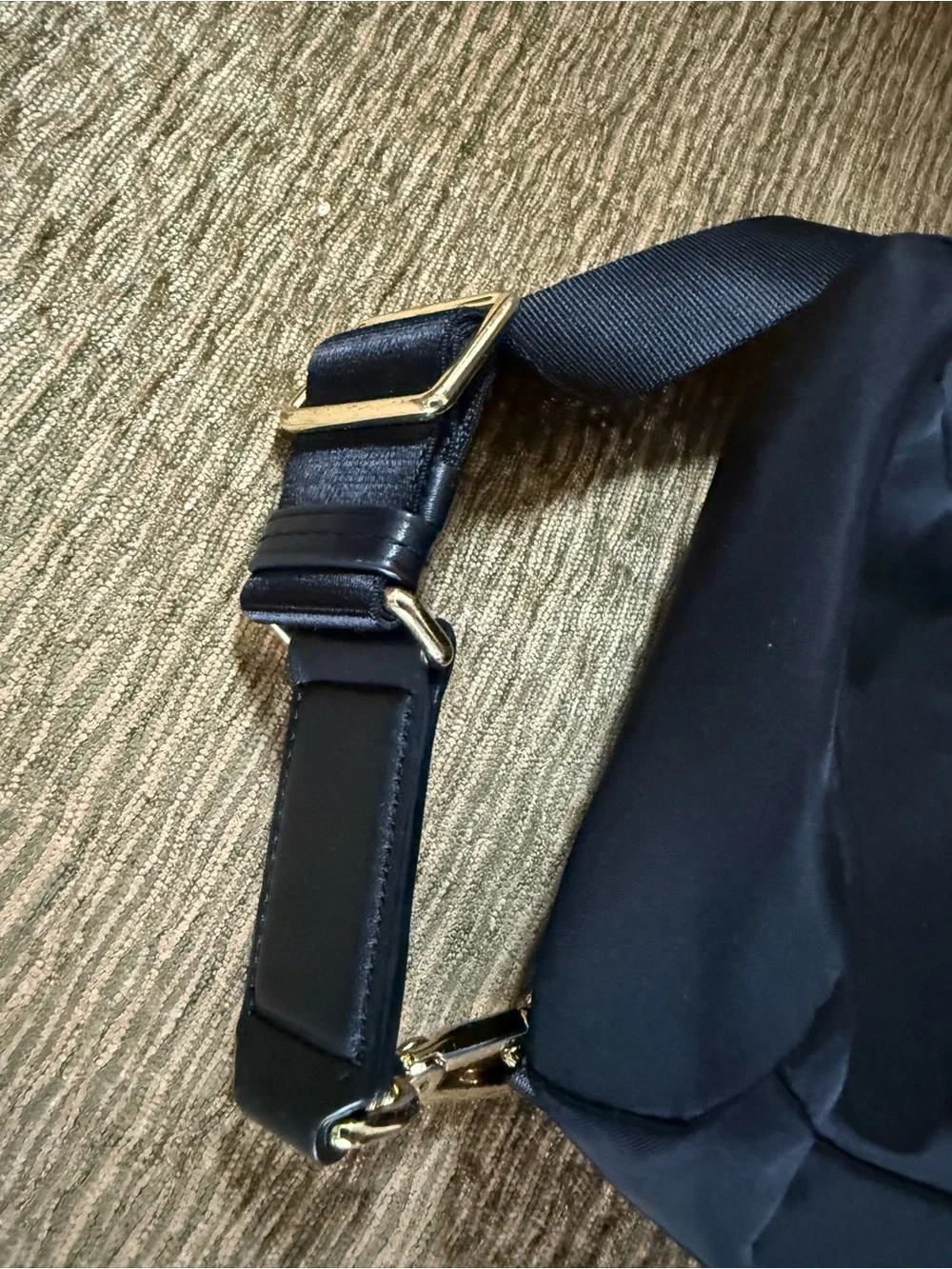 Tumi Black Sling Belt Bag with Gold Hardware